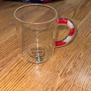 Starbucks Glass Mug with Vibrant Red and White Handle